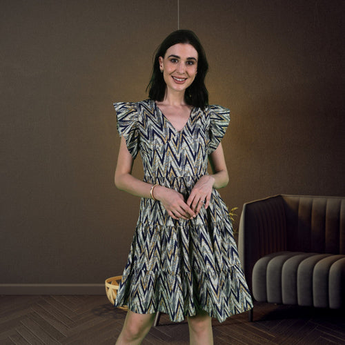 Jade Poppy short maxi dress for women, stylish and flowy with a vibrant pattern, perfect for summer or special occasions