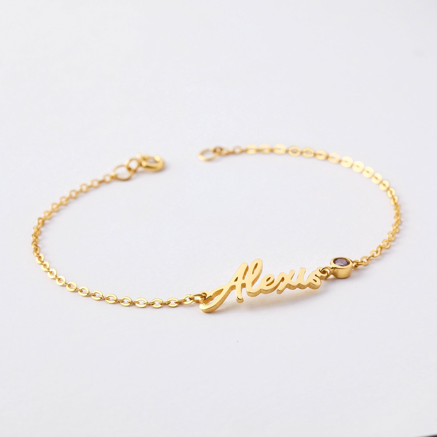 Personalized Green Millie cursive name bracelet with tween girl gift style, featuring a delicate chain and custom name engraving.