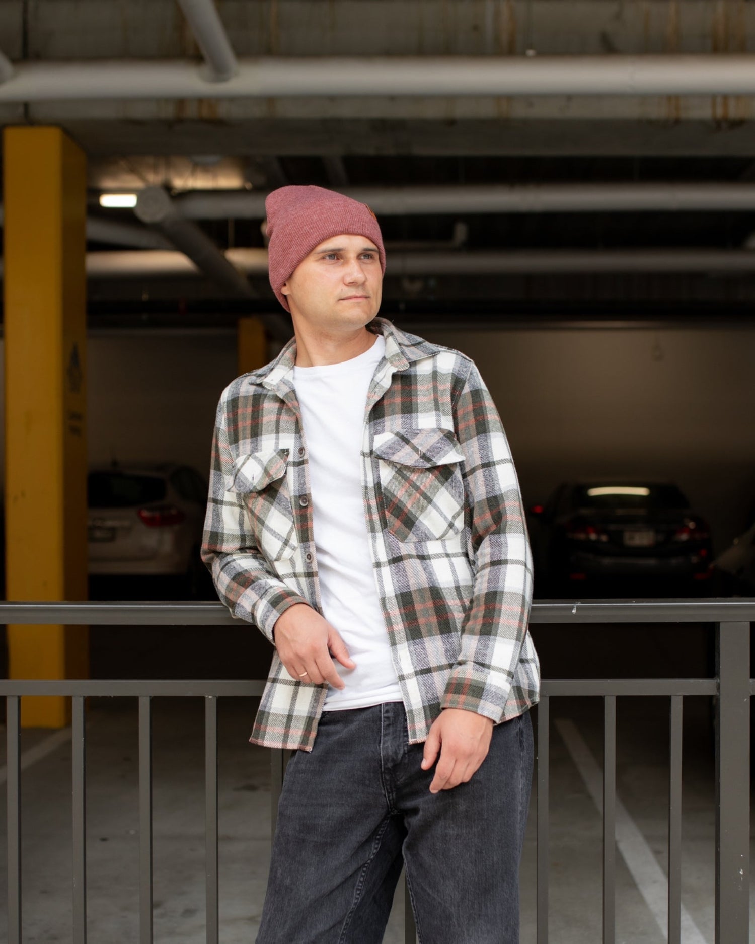 Azure Arrowwood HAAKWEAR knit cuffed beanie in rusty burgundy, featuring a cozy knit design and cuffed style for warmth and style.