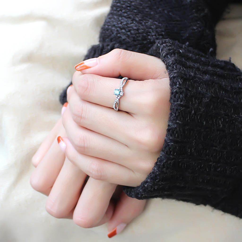 High polished stainless steel ring with AAA grade finish from Turquoise Tiger, showcasing a sleek, reflective jewelry design.
