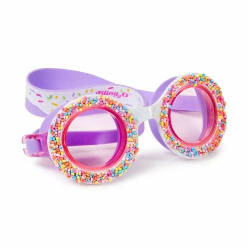 Purple donut-shaped goggles for kids by Ivory Trillium, featuring fun and colorful design for playful fashion.