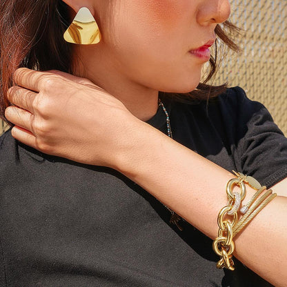 Lavender Phoebe curved triangle earrings in gold-tone jewelry with sleek, modern design for stylish accessory.