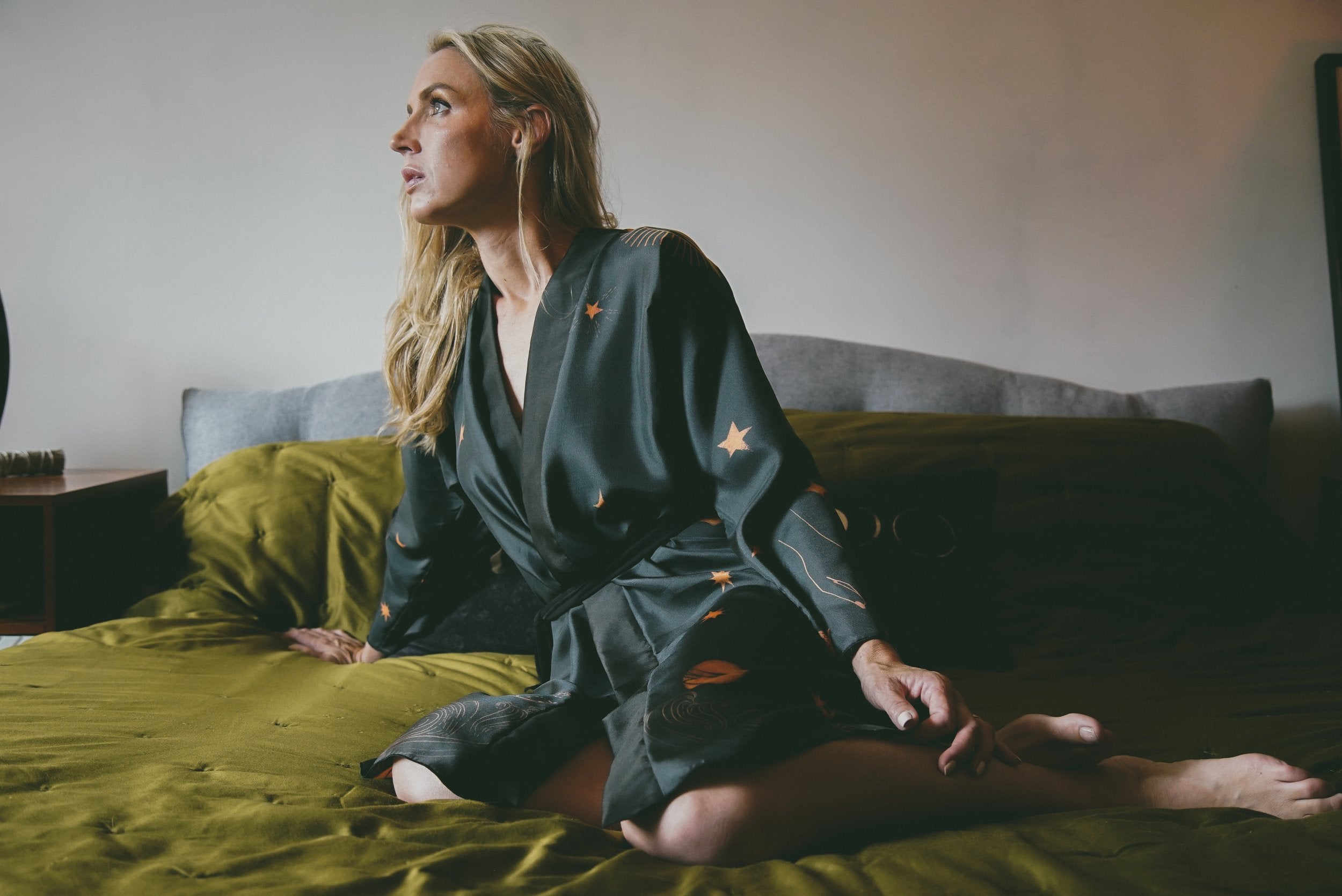Violet Apollo Rigel Robe in Twilight, women’s clothing with flowing fabric and elegant design, hanging on a clothing rack.