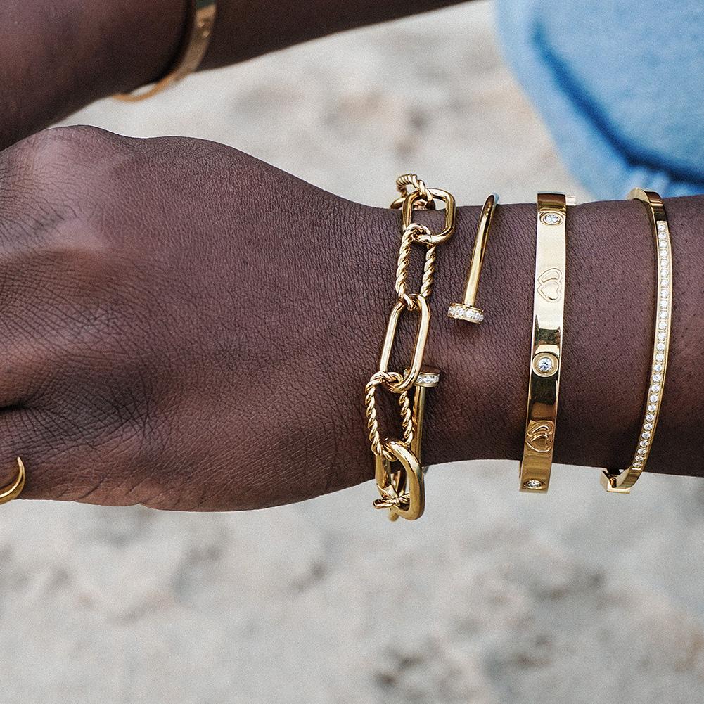 Lavender Phoebe layered bangle ring set with multiple silver-tone rings and bangles, stylish jewelry collection for women.