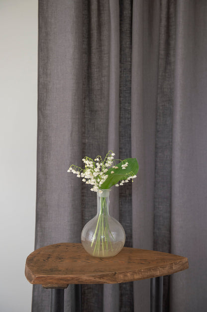 Grey linen curtain with rod pocket, Magenta Sugarplum home decor, showing the fabric texture and hanging style.