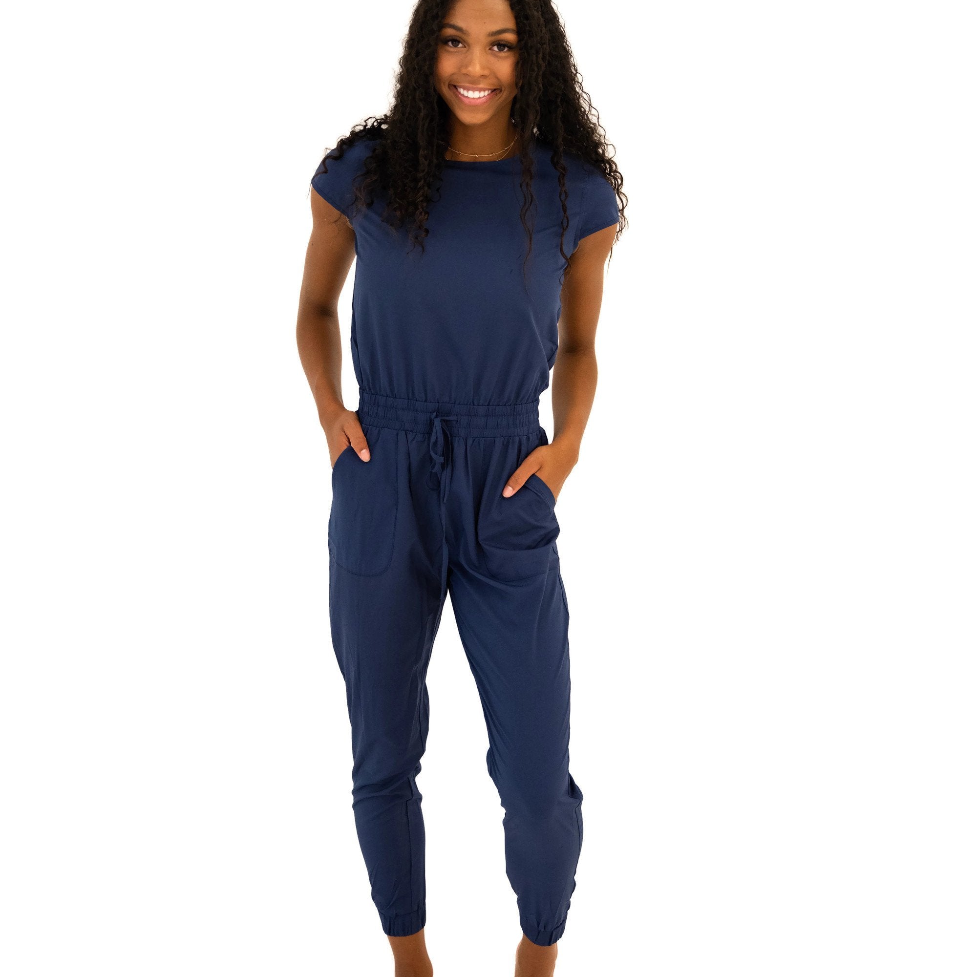 Lavender Danae DT Unity Navy jumpsuit for women, stylish one-piece outfit with a fitted silhouette and sleeveless design.