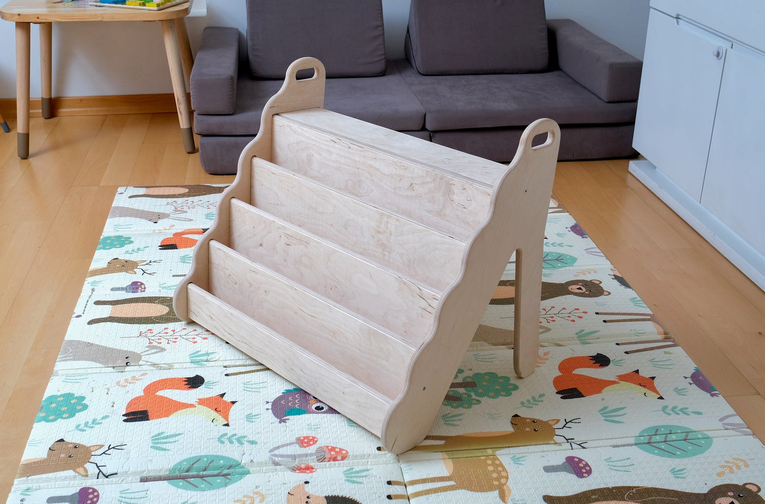 Red Oceanus wooden bookshelf in small, medium, or large size, showcasing its natural wood finish and sturdy furniture design.