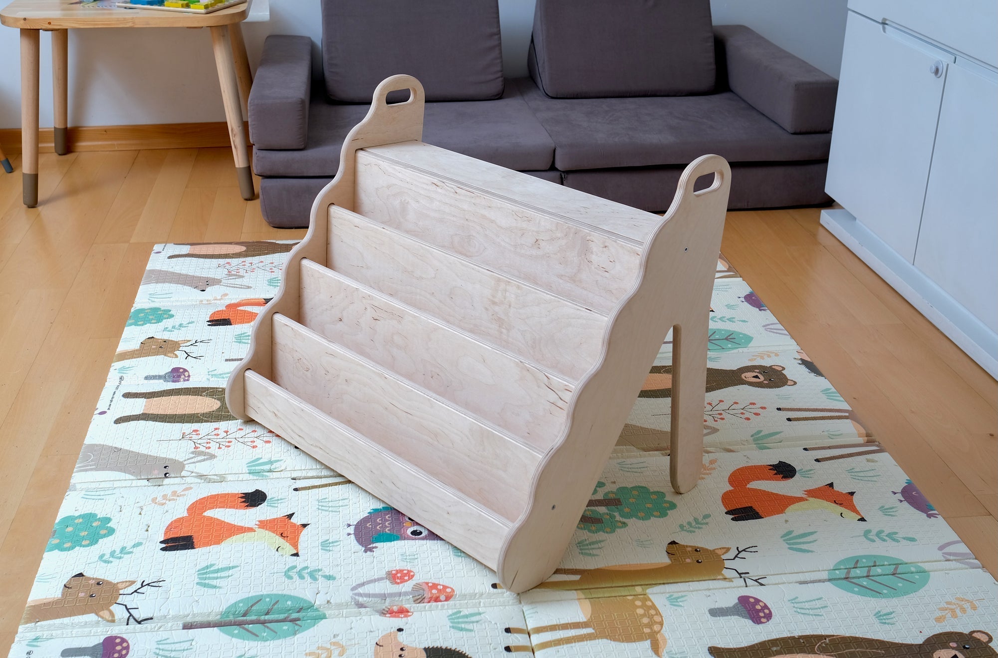 Red Oceanus wooden bookshelf in small, medium, or large size, showcasing its natural wood finish and sturdy furniture design.