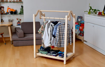 Wooden kids clothing rack by Red Oceanus, featuring a sturdy furniture piece with hooks and shelves for children&