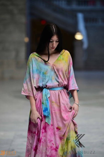 Dreamy watercolor-style kaftan dress by Erin Pontus featuring light, soft fabrics and fairytale-inspired colors.