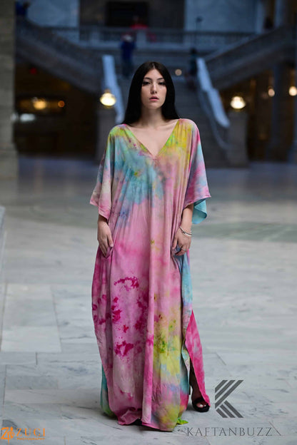 Dreamy watercolor kaftan dress by Erin Pontus featuring soft fabric and fairytale-inspired colors, flowing and elegant.