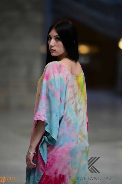Light and soft Dreamy Watercolor Kaftan dress by Erin Pontus featuring fairytale-inspired colors and flowing fabric.