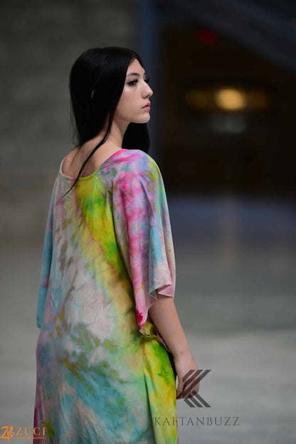 Dreamy watercolor kaftan dress by Erin Pontus featuring light, soft fabric and fairytale-inspired pastel colors.