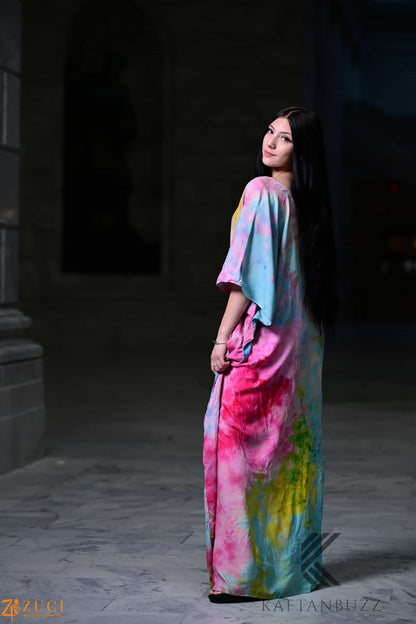 Dreamy watercolor kaftan dress by Erin Pontus with light, soft fabric and fairytale-inspired colors, flowing and elegant.