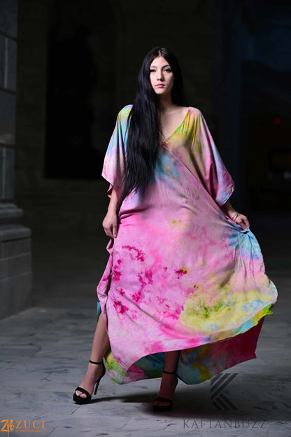 Dreamy watercolor kaftan dress by Erin Pontus featuring light, soft fabric and fairytale-inspired colors, perfect for boho style.