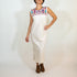White Maxi Isidra Mexican embroidered dress for women by Violet Athena, featuring intricate embroidery and flowing fabric.