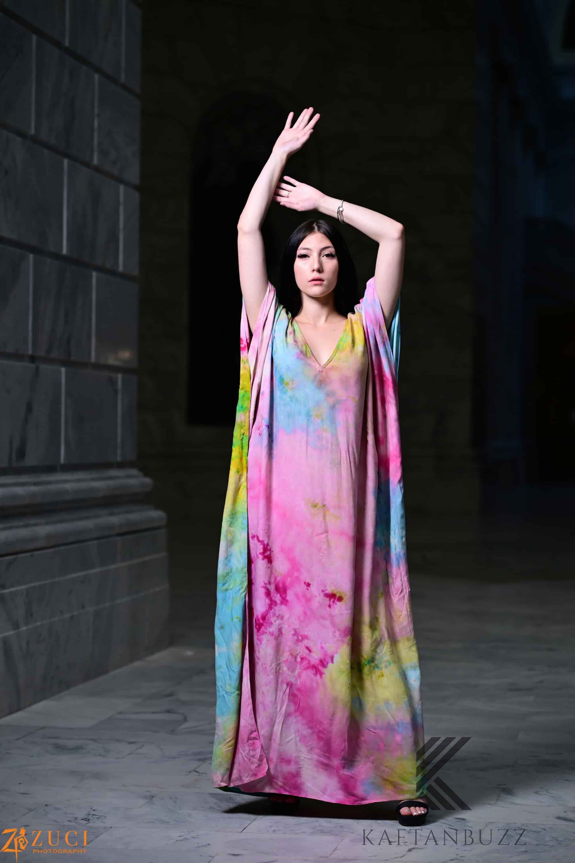 Dreamy watercolor kaftan dress by Erin Pontus featuring light, soft fabric and fairytale-inspired colors, perfect for elegant summer wear.
