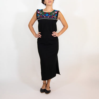 Black Maxi Isidra dress by Violet Athena featuring hand-embroidered colorful floral patterns, perfect for elegant women&