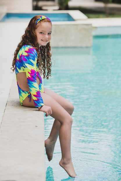 Bright neon tie-dye one-piece kids swimwear by Bronze Tartarus, featuring colorful patterns and comfortable fit for children.