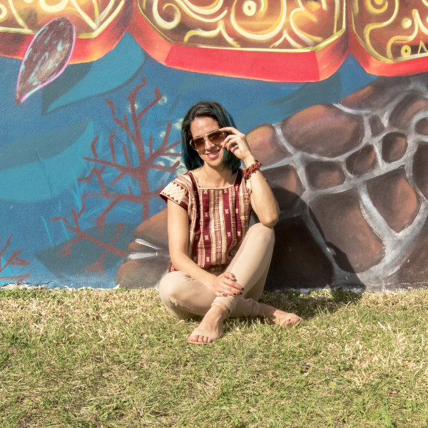 Handmade Burgundy Huipil for women from Violet Athena, featuring traditional embroidery and vibrant woven details.