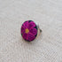 Violet Athena textile flower Mexican ring for women, featuring colorful fabric flower design on a silver band.