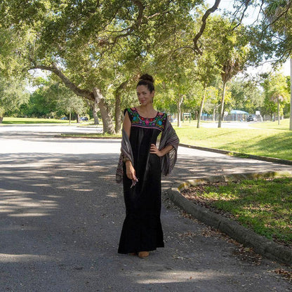 Black Maxi Isidra dress by Violet Athena featuring hand-embroidered colorful floral designs for women&