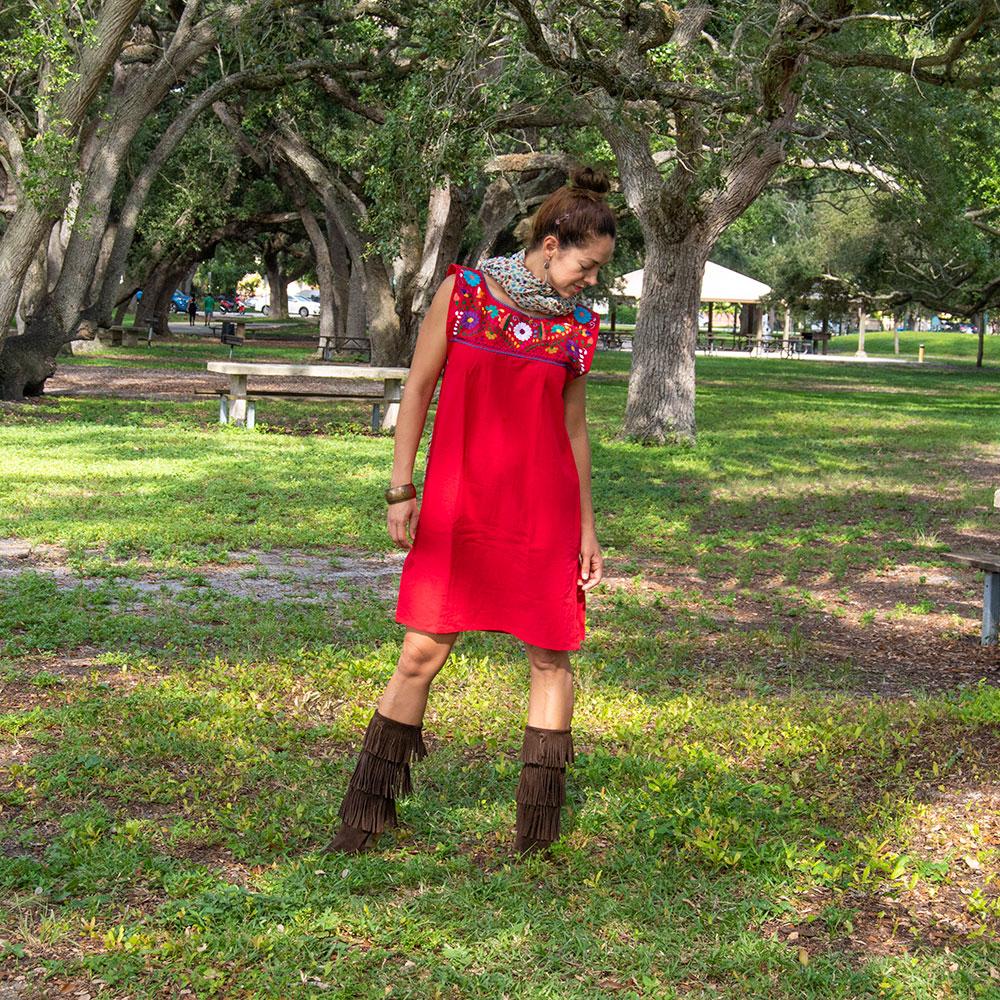 Violet Athena Elvira folk handmade dress for women with intricate embroidery and vibrant colors, displayed on a mannequin.