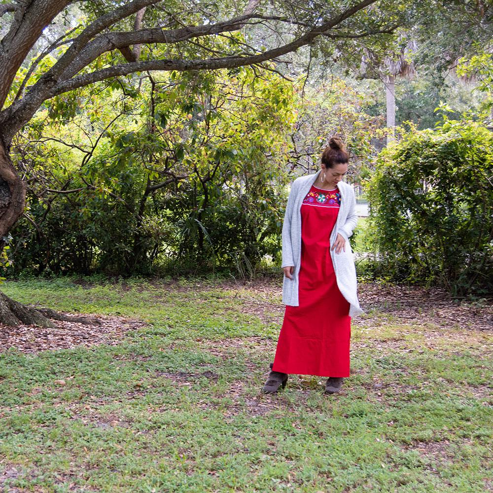 Violet Athena Maxi Isidra folk dress with embroidered floral patterns, flowing fabric, and long sleeves, perfect for casual or traditional wear.