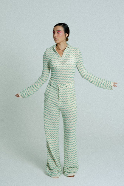 Green lightweight long sleeve button-up cotton knit shirt for women by Raspberry Molly, shown on a model.