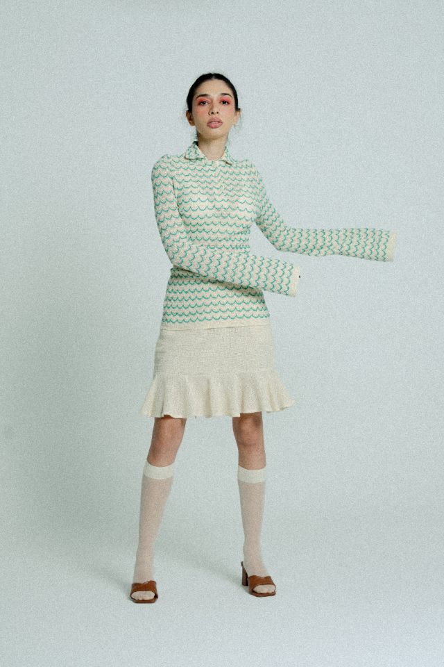 Green lightweight long sleeve cotton knit button-up shirt for women by Raspberry Molly, shown on a model.