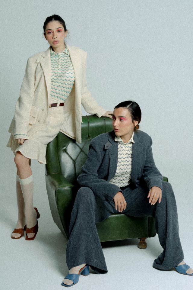 Green lightweight long sleeve button-up cotton knit shirt for women by Raspberry Molly, styled on a model.