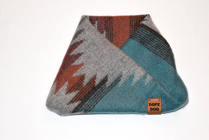 Scarlet Gaia Yosemite Dog Scarf featuring a stylish, cozy design perfect for pets, shown on a small dog in outdoor setting