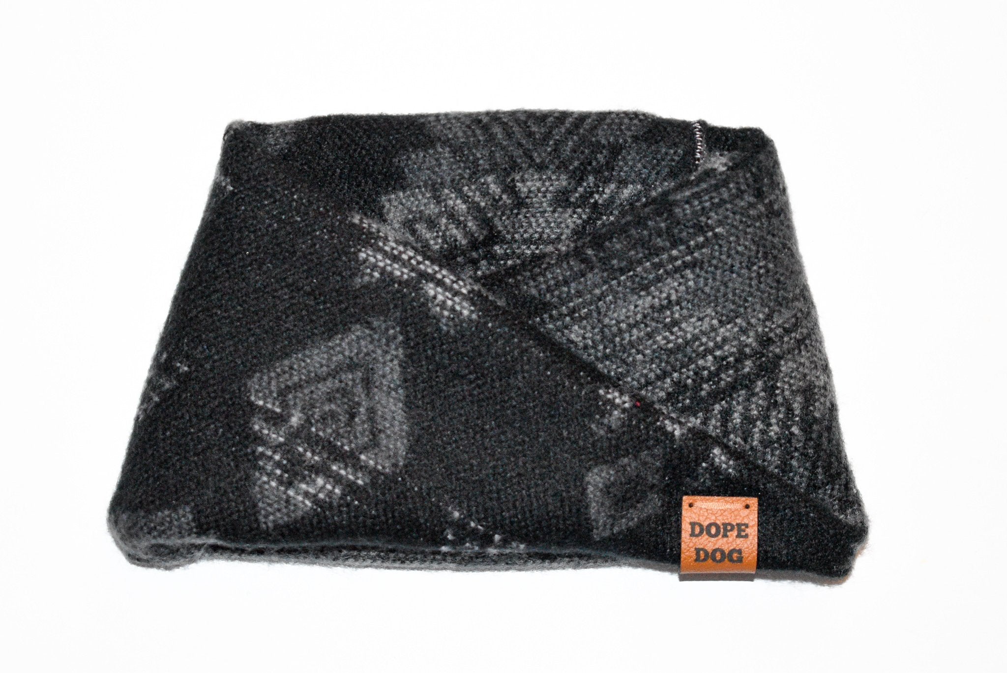 Scarlet Gaia Acadia dog scarf featuring a colorful, cozy pet accessory for dogs, displayed on a pet with a blurred outdoor background.
