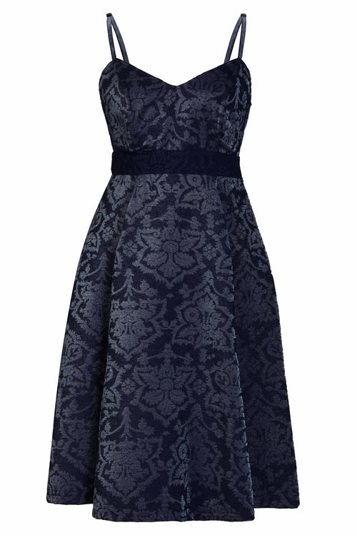 Blush Athena jacquard skater dress with fitted bodice and flared skirt, featuring intricate woven pattern and elegant design.