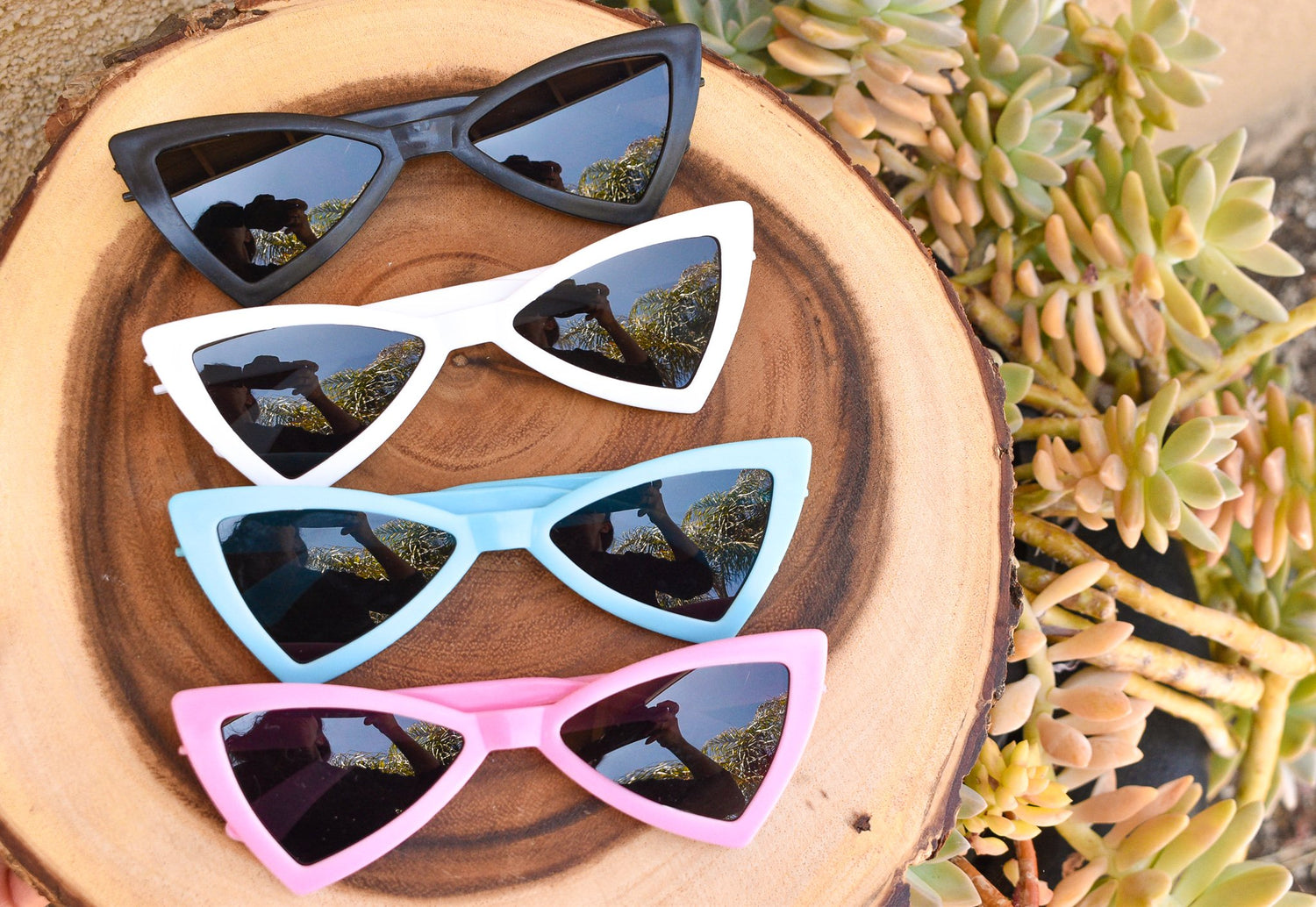 Scarlet Gaia dog sunglasses for pets with black frames and tinted lenses, designed to protect dogs&
