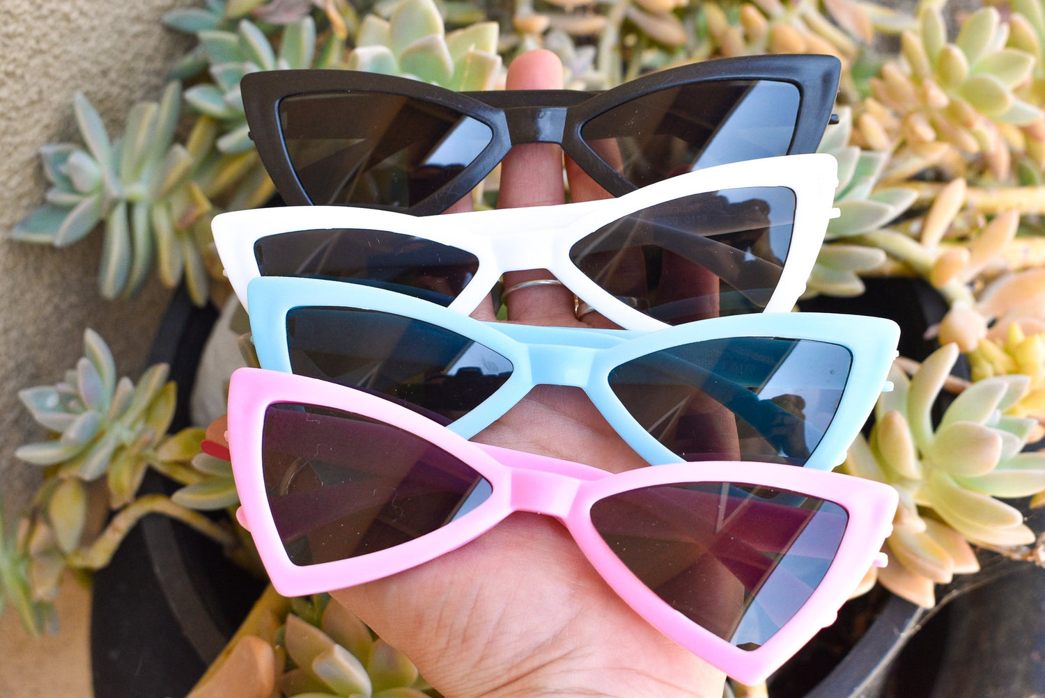 Scarlet Gaia dog sunnies with black frames and tinted lenses, stylish pet eyewear for small dogs.