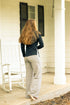 Wide leg Alpaca cotton pants by Silver Chrysanthemum, showing soft fabric and relaxed fit in a natural pose.