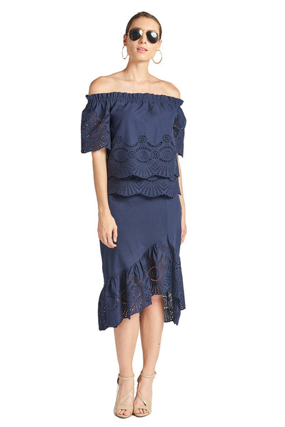Navy Aster Skirt by Peach Dionysus, cotton eyelet asymmetric hi-lo design, shown in front view with a casual lifestyle setting