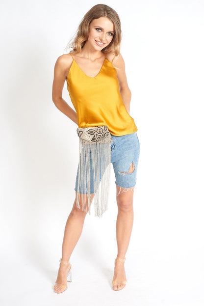 Light blue denim high-waisted Bermuda shorts for women, showcased on a hanger with a casual, trendy fit.
