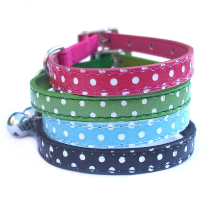Salmon Oscar polka dot cat collar with adjustable strap and metal buckle, part of the Dottie collection for stylish feline accessories.
