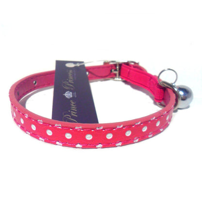 Pink polka dot cat collar from Salmon Oscar with a cute, adjustable design for comfortable pet wear.