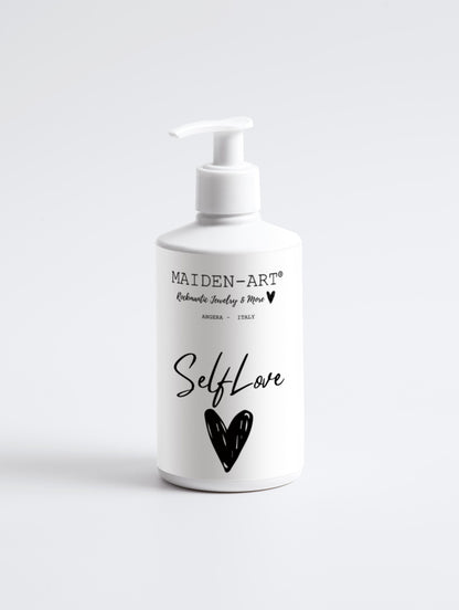 Pink Lucky Self-Love Bliss moisturizing body lotion bottle with a soft pink label, displayed on a white background.