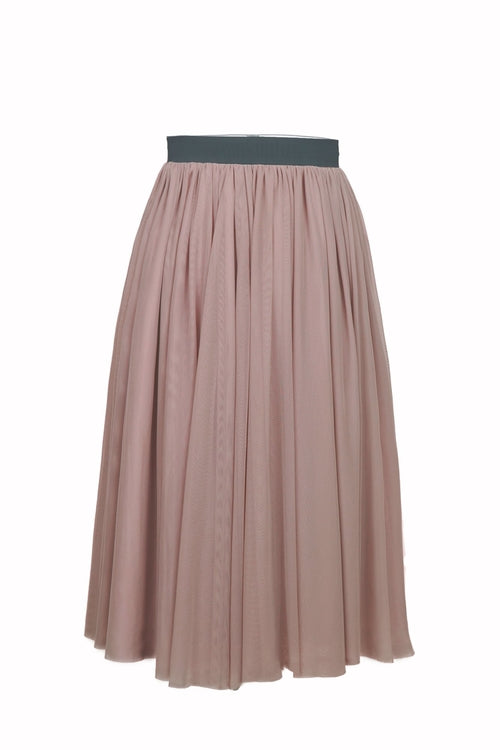 Dusty rose Sweet Pea skirt by Salmon Bella displayed on a ghost mannequin, showcasing its flowy fabric and stylish design.