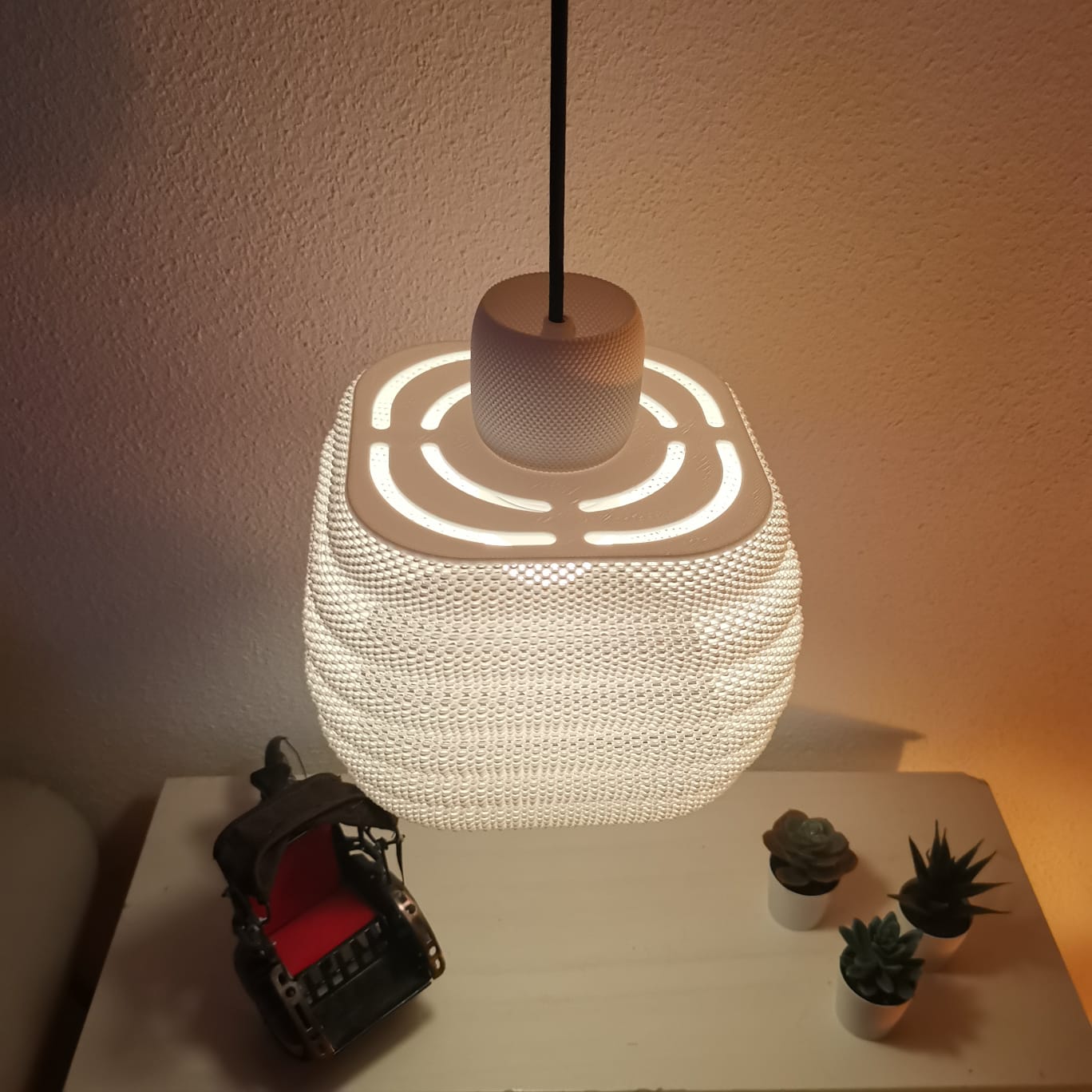 Azure Pontus Dynasty Ripple Pendant Lamp hanging with a sleek, modern design and intricate ripple pattern for contemporary lighting.