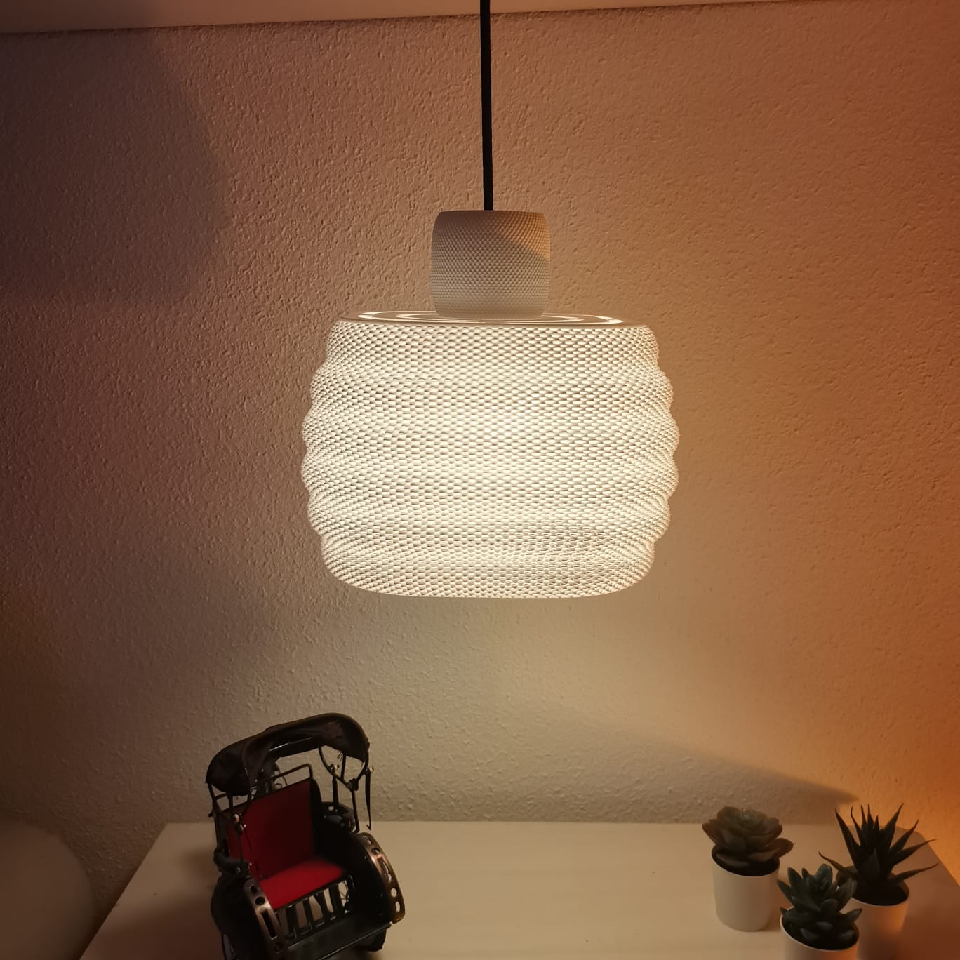 Azure Pontus Dynasty Ripple Pendant Lamp hanging with a textured ripple design, perfect for modern lighting decor.