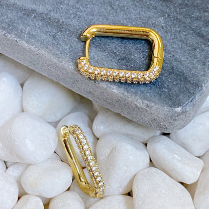 Fuchsia Hercules So Chic hoop earrings in gold-tone metal with a sleek, minimalist design for stylish jewelry accessories.