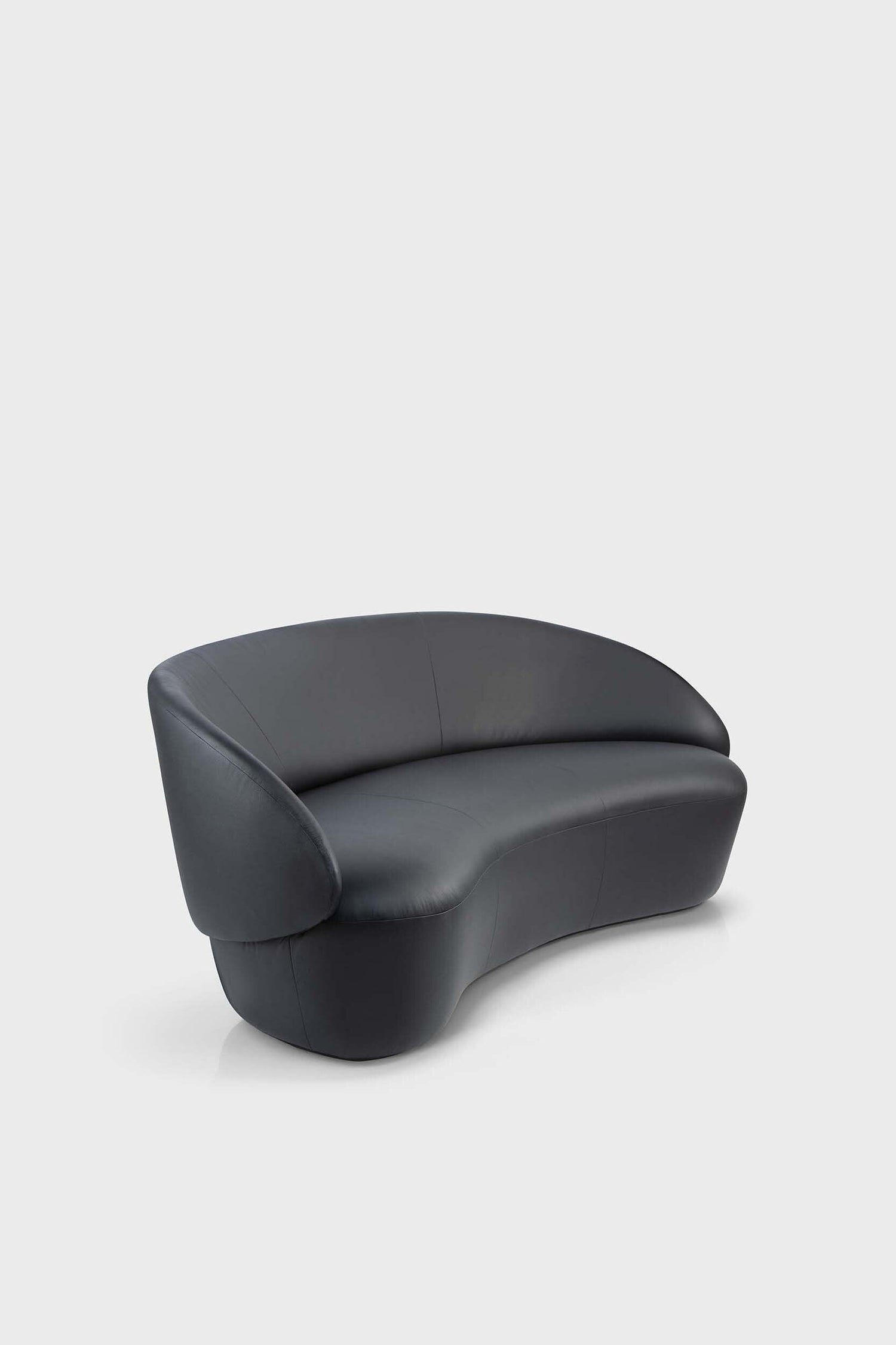 Black Naïve Sofa from Aquamarine Poppy, modern furniture with plush cushions and sleek design, shown in a stylish living room setting.