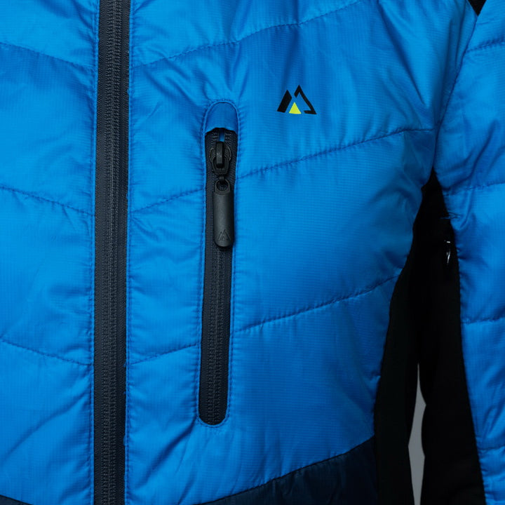 Women’s blue EcoDown jacket by Rose Hemera, lightweight activewear with a fitted design and full front zipper, suitable for outdoor activities.