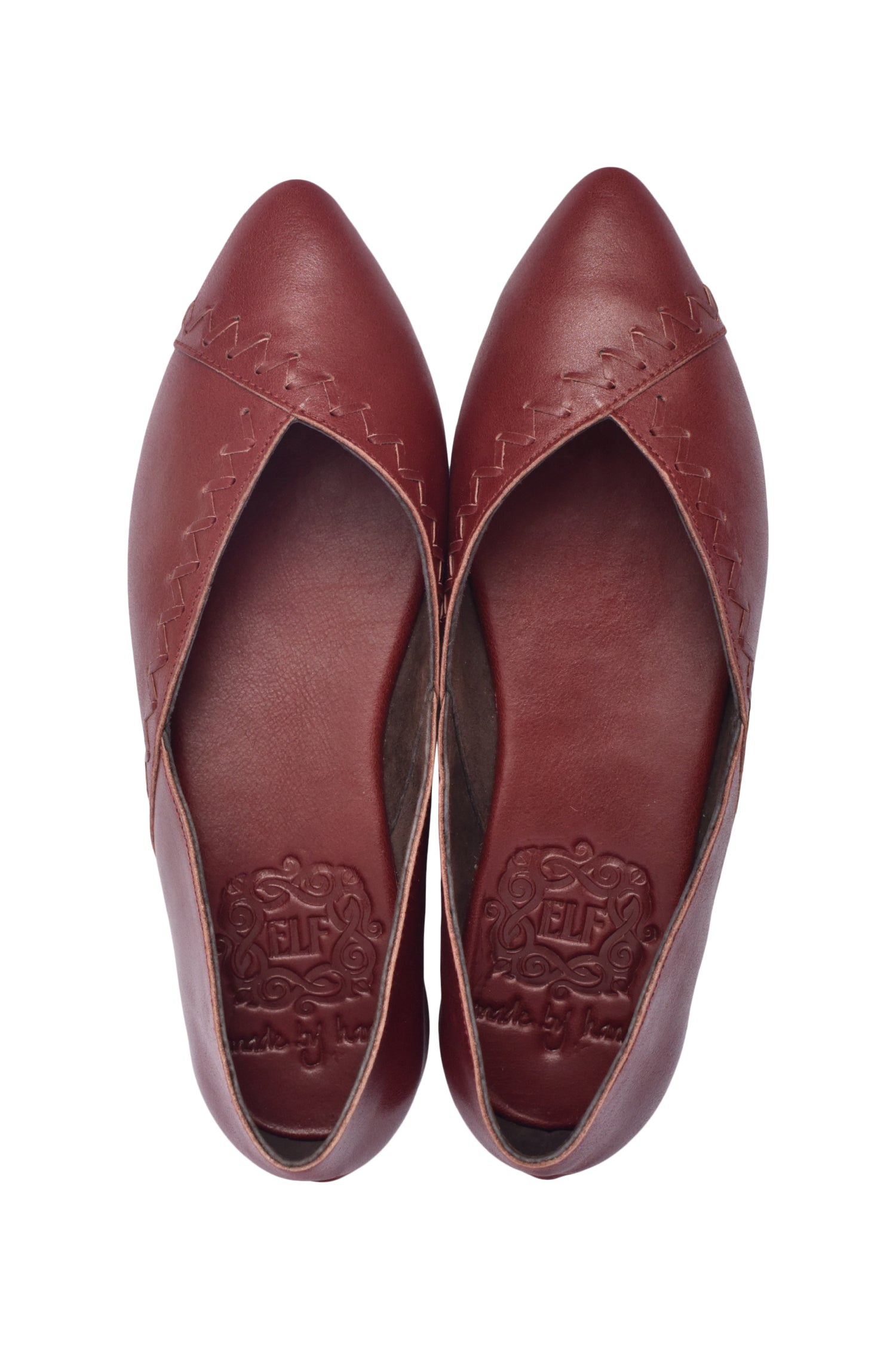 Maroon Elle pointed toe leather flats for women from Gold Ares, featuring sleek design and stylish craftsmanship.