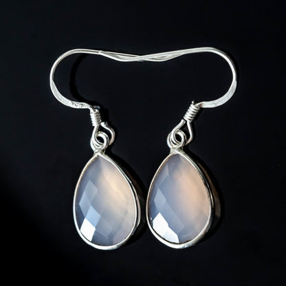 Sapphire Maple Emilia Chalcedony tear-drop earrings with silver hooks, featuring smooth, polished blue chalcedony stones.